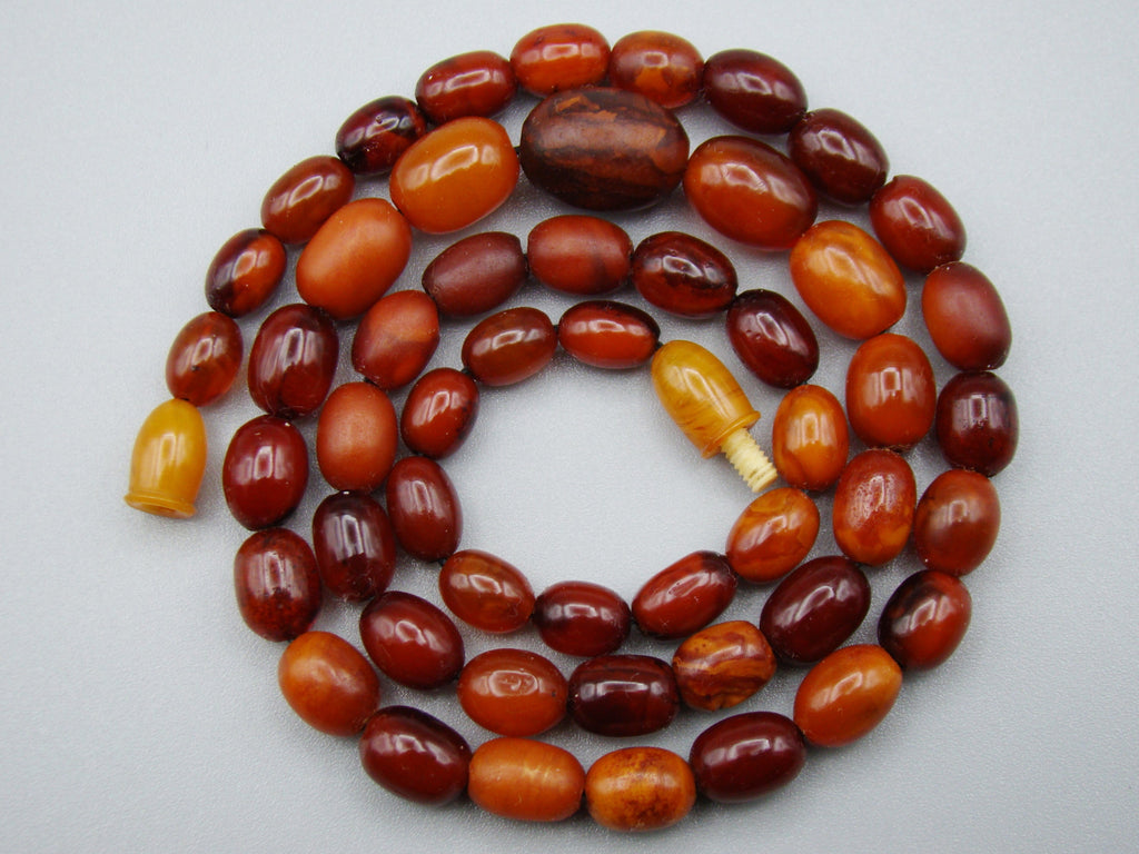 baltic amber, amber, antique, amber beads, egg Yolk, amber chain, Rosary beads, مسبحة, Masbaha, Muslim prayer beads حبيت الدورة ,العنبر الهندى