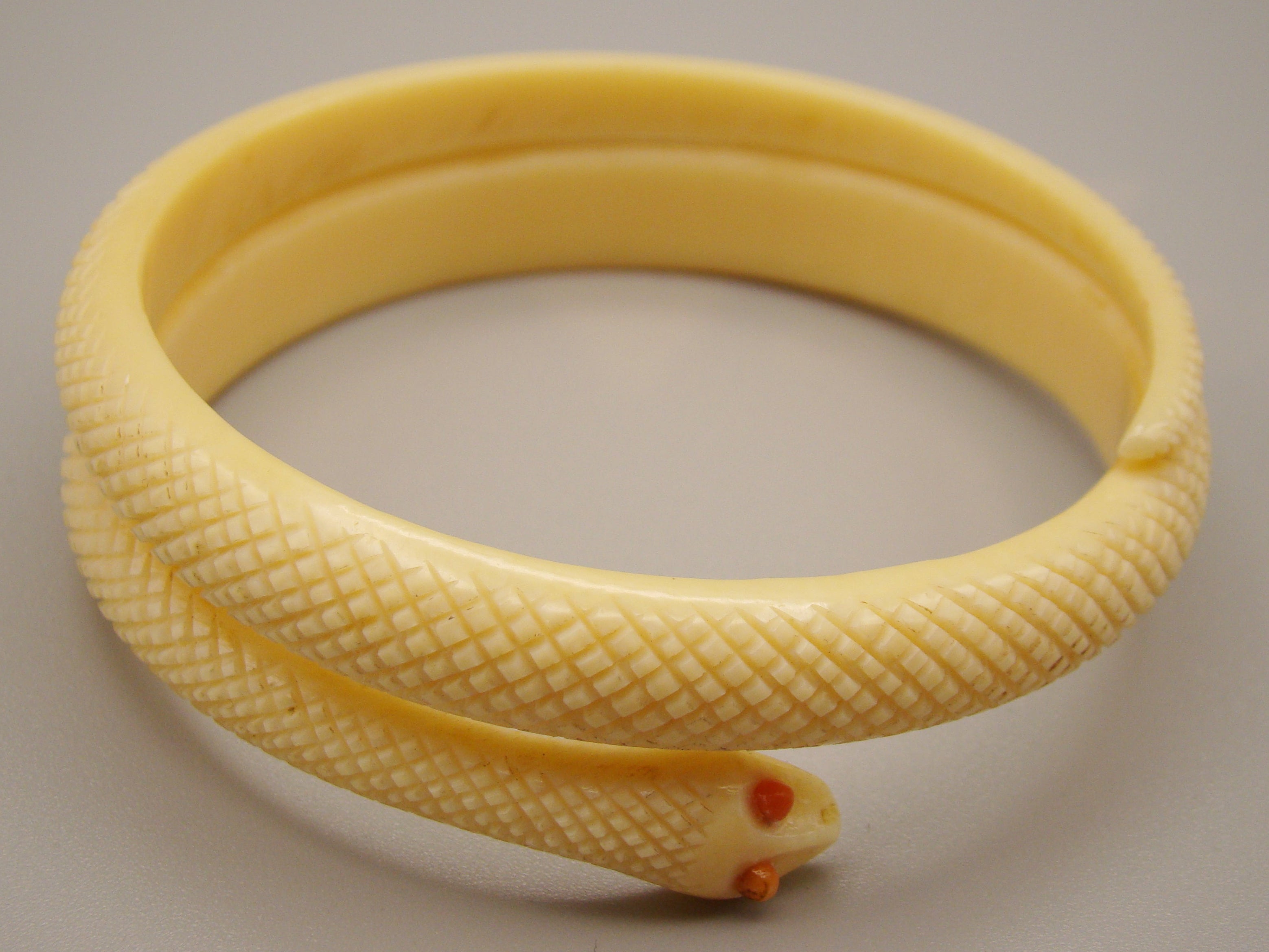 Antique Natural Elephant Ivory Bracelet with Natural Salmon Coral Eyes - Kingdom of Antique Arts