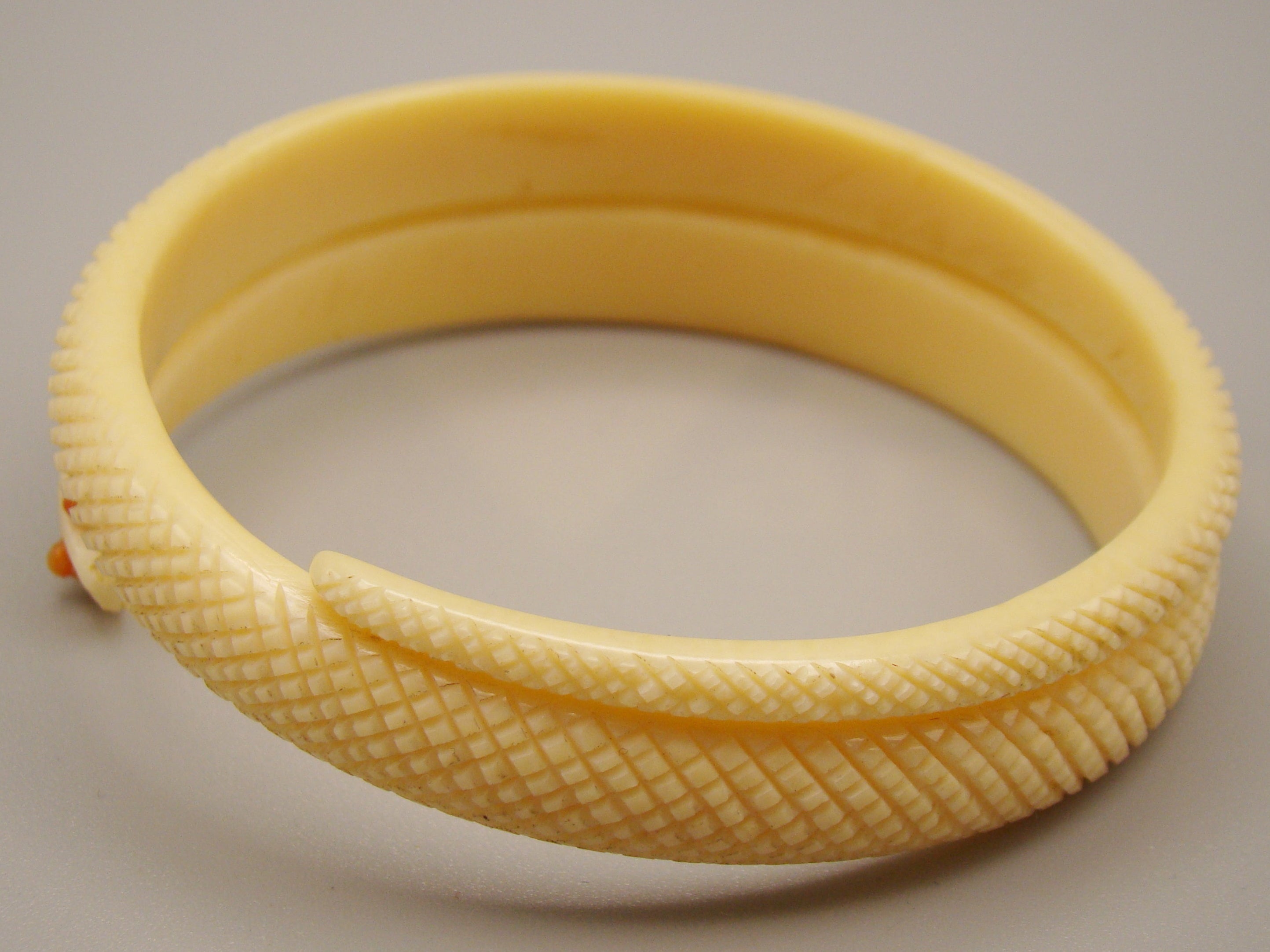 Antique Natural Elephant Ivory Bracelet with Natural Salmon Coral Eyes - Kingdom of Antique Arts