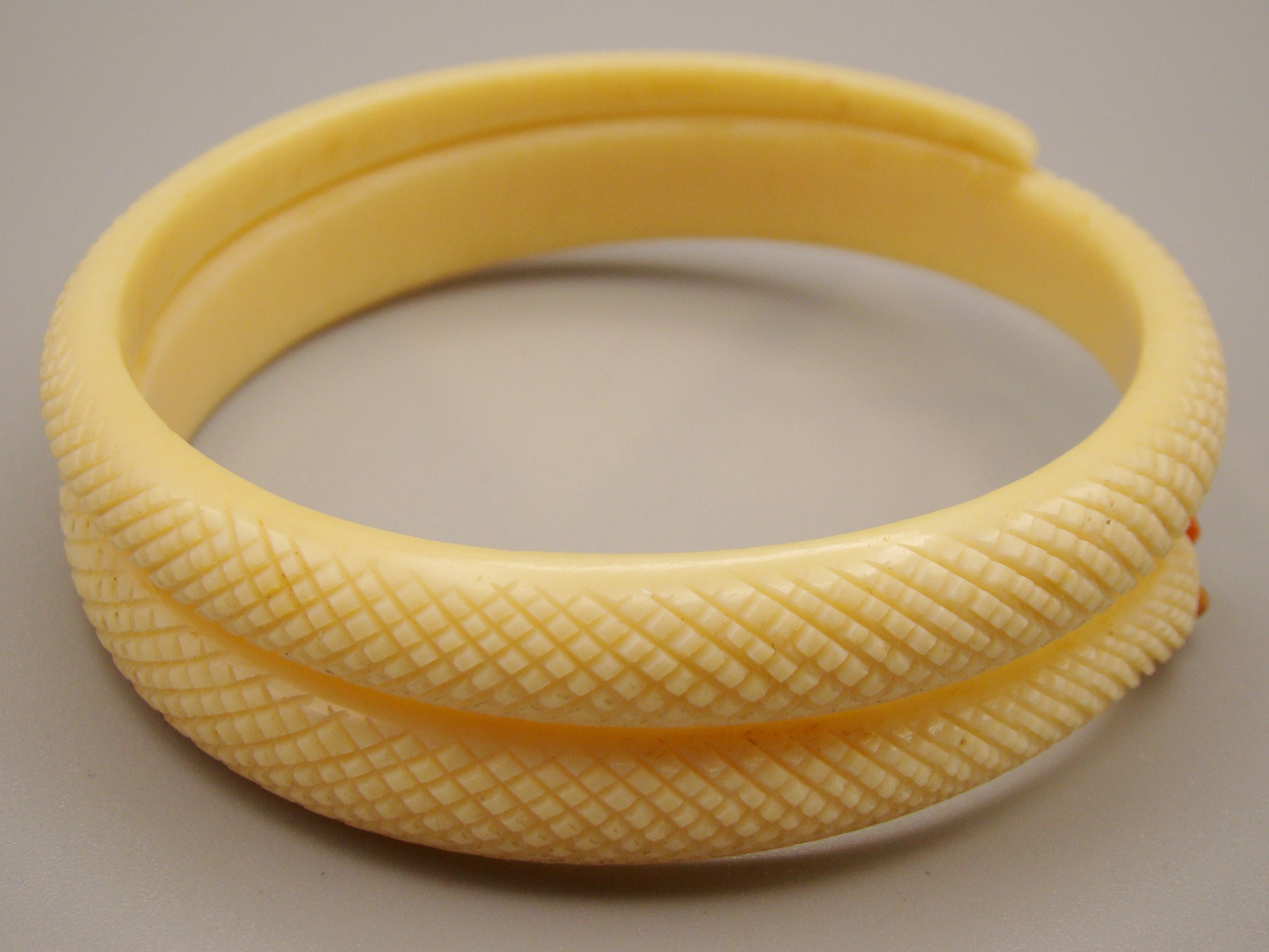 Antique Natural Elephant Ivory Bracelet with Natural Salmon Coral Eyes - Kingdom of Antique Arts