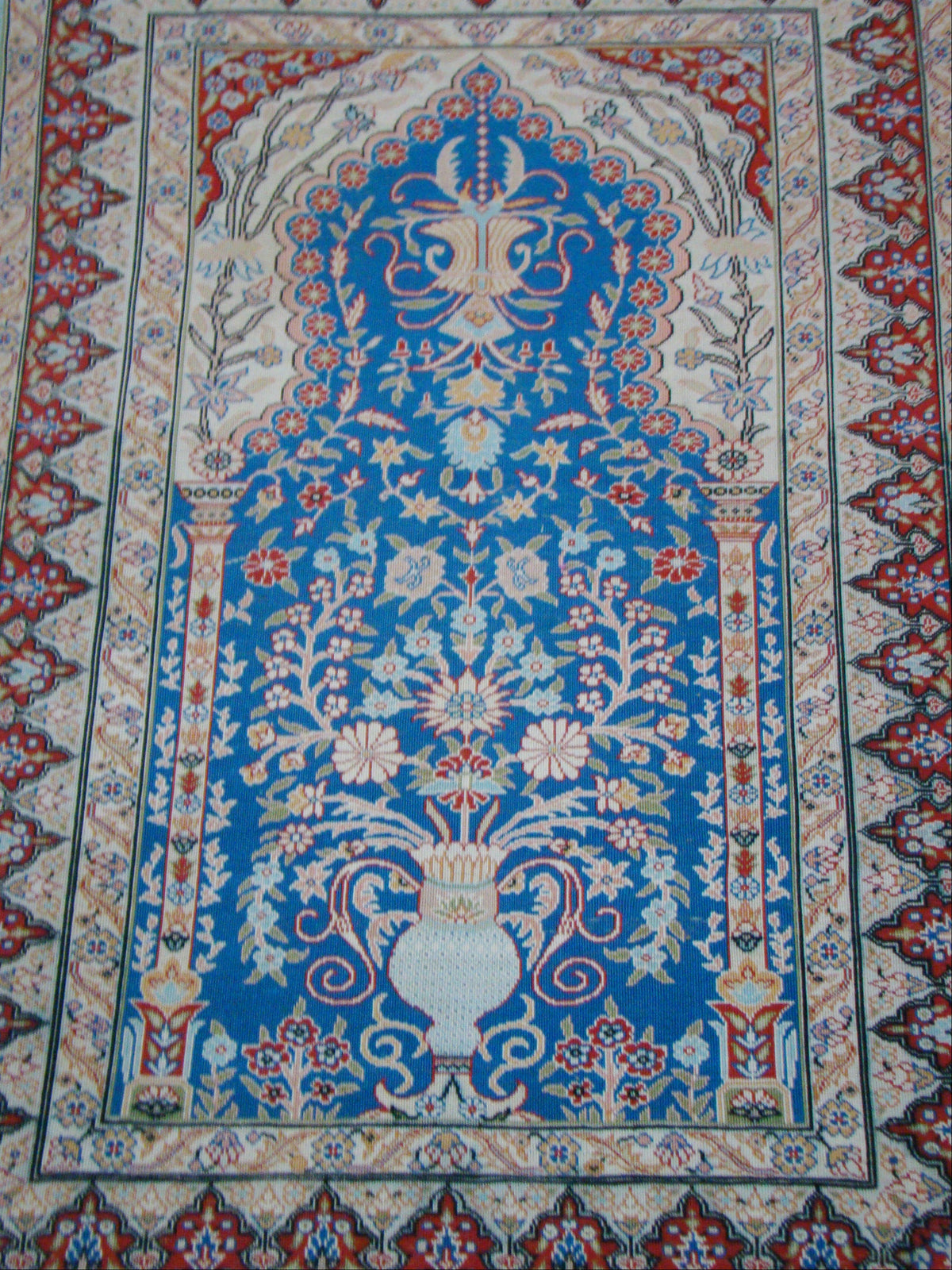 Antique Hereke silk wall carpet displayed on wall pictorial design CA015