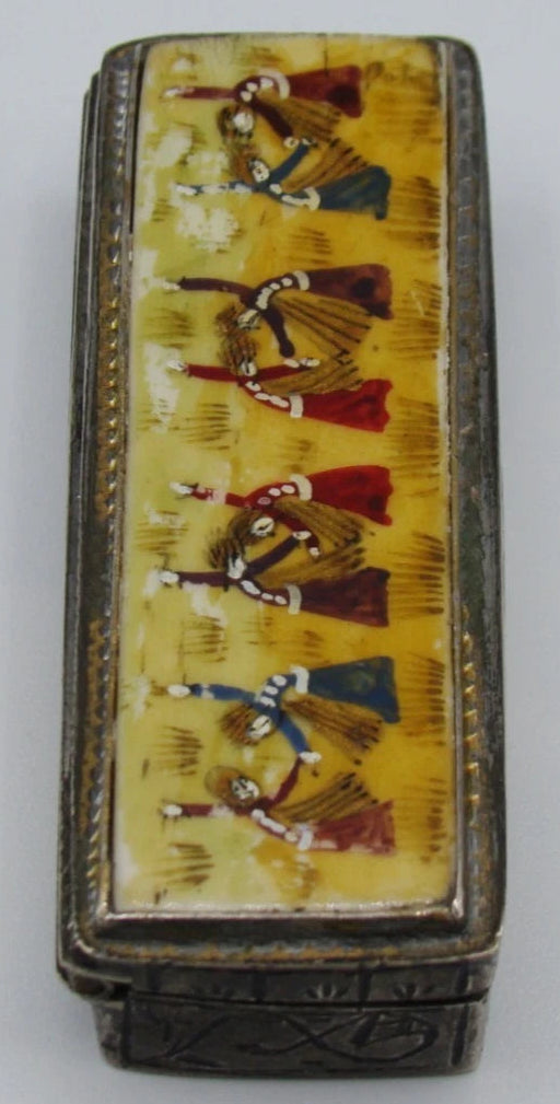 Lengthwise view of the dancing-figure lid panel and silver border