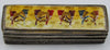 Opposite side view of the closed silver box showing the decorated lid and engraved sides