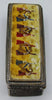 Angled end view of the miniature silver box and enamel-on-bone figural panel