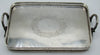 Ottoman-attributed rectangular silver tray with two ornate handles and engraved central floral wreath