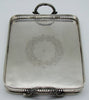 Alternate lengthwise view of the engraved silver tray and pierced rim
