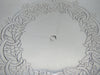 Close-up of stamped marks below the pierced gallery of the silver tray