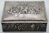 900 silver rectangular box showing the boating relief on its lid and tavern scene on the front.