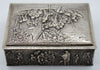 Opposite side of the silver box with tavern figures in relief and the decorated lid above.