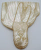 Opposite angled view of carved shell portrait with luminous robes and bearded face