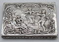 800 silver rectangular box with pastoral relief scene, a figure on a swing, and floral scrollwork border.