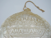 Opposite angled view of mother-of-pearl Last Supper carving and pierced lower border