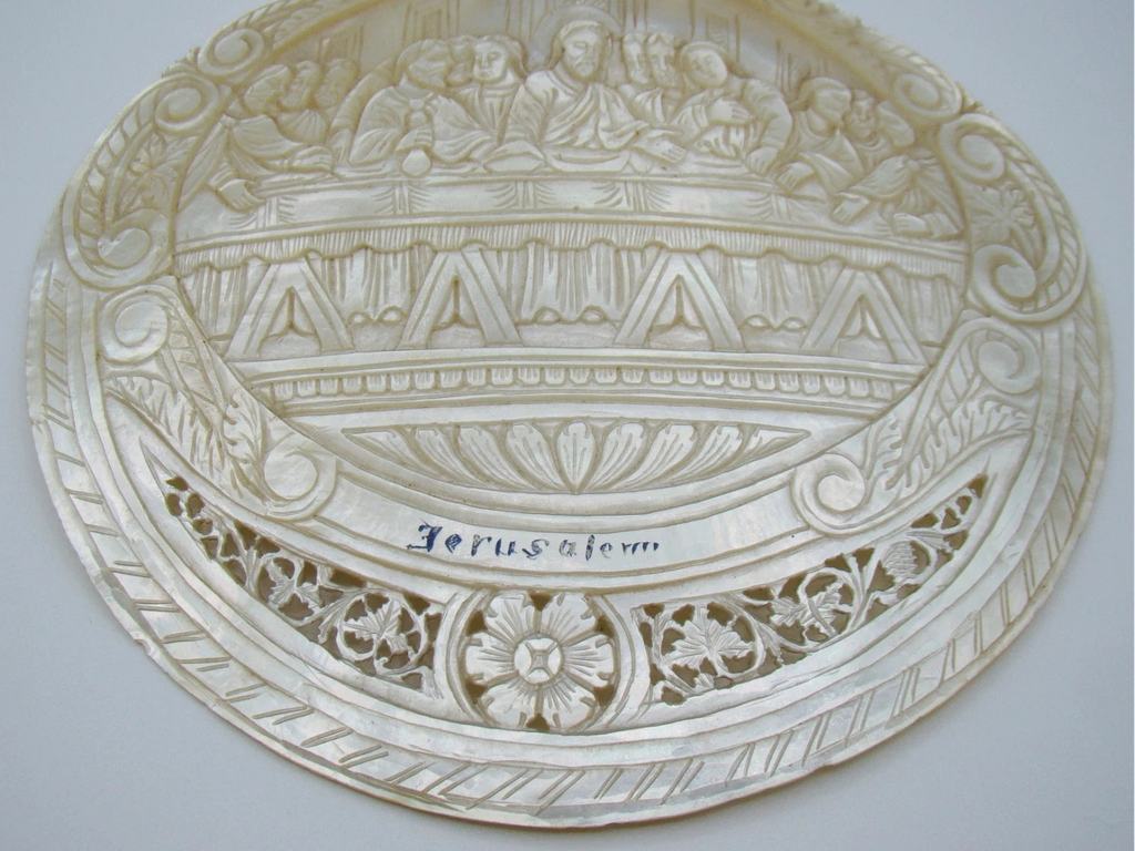Detail of Jerusalem inscription, carved table and floral openwork on mother-of-pearl shell