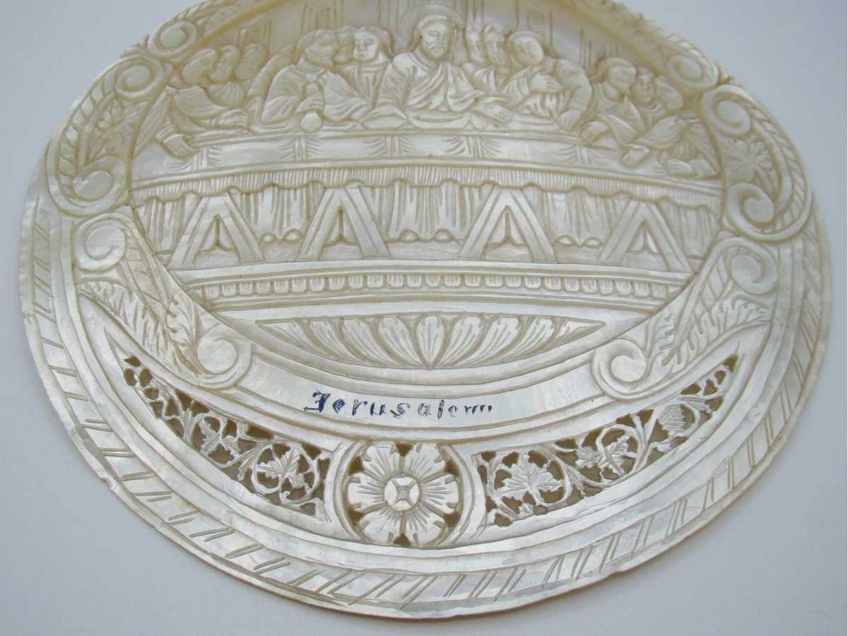 Detail of Jerusalem inscription, carved table and floral openwork on mother-of-pearl shell