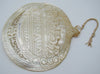 Reverse of mother-of-pearl Last Supper shell showing curved surface and pierced ornament