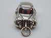 Rear view of silver miniature car with modelled bumper