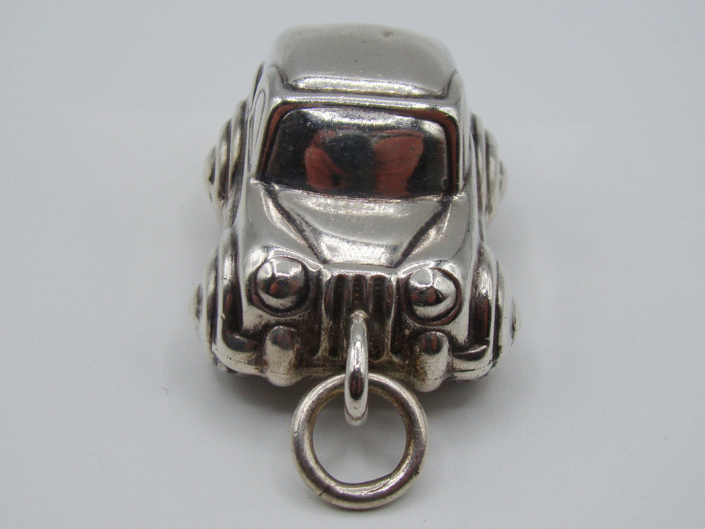 Rear view of silver miniature car with modelled bumper