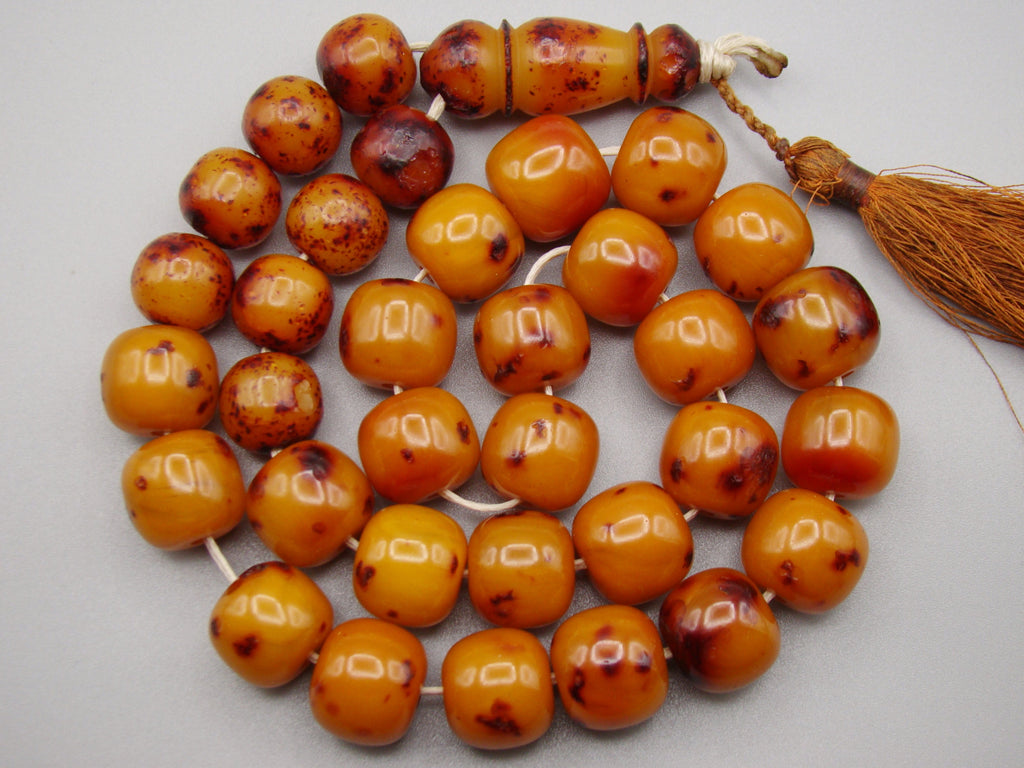 German Bakelite amber, amber, antique, amber beads, egg yolk, amber Rosary, Rosary beads, مسبحة, Masbaha, Muslim prayer beads حبيت الدورة ,العنبر الهندى, الباكليت الألمانية