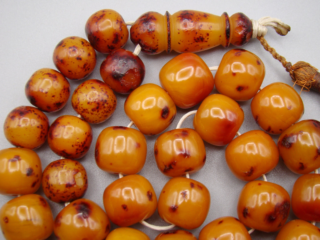 German Bakelite amber, amber, antique, amber beads, egg yolk, amber Rosary, Rosary beads, مسبحة, Masbaha, Muslim prayer beads حبيت الدورة ,العنبر الهندى, الباكليت الألمانية