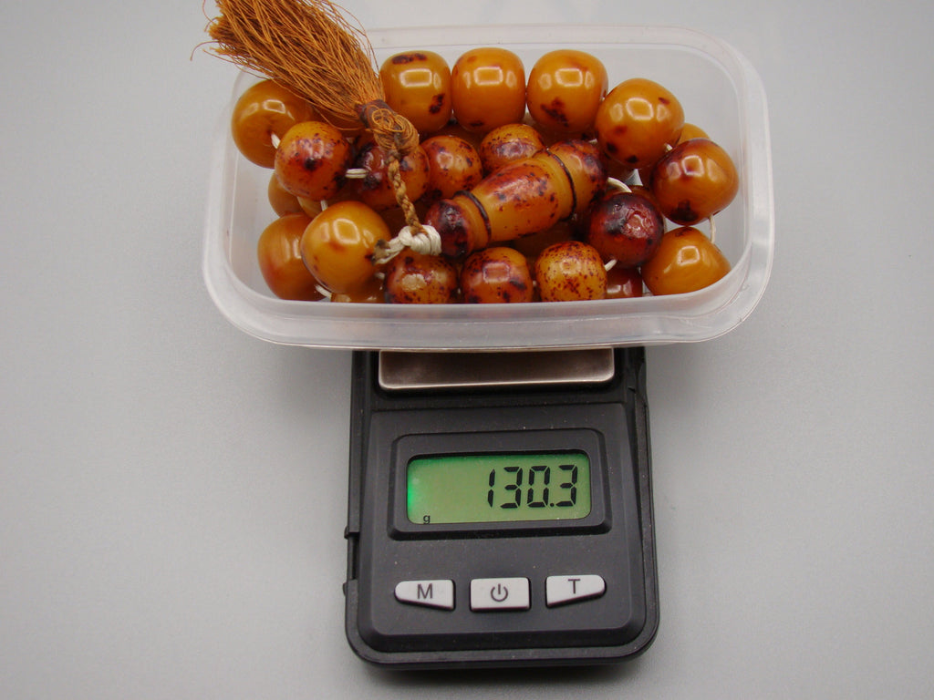 German Bakelite amber, amber, antique, amber beads, egg yolk, amber Rosary, Rosary beads, مسبحة, Masbaha, Muslim prayer beads حبيت الدورة ,العنبر الهندى, الباكليت الألمانية