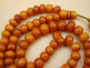 baltic amber, amber, antique, amber beads, egg Yolk, amber chain, Rosary beads, مسبحة, Masbaha, Muslim prayer beads حبيت الدورة ,العنبر الهندى, Rosary, Sterling Silver, Tassel, natural amber