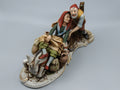 Merchant pair with donkey porcelain figurine