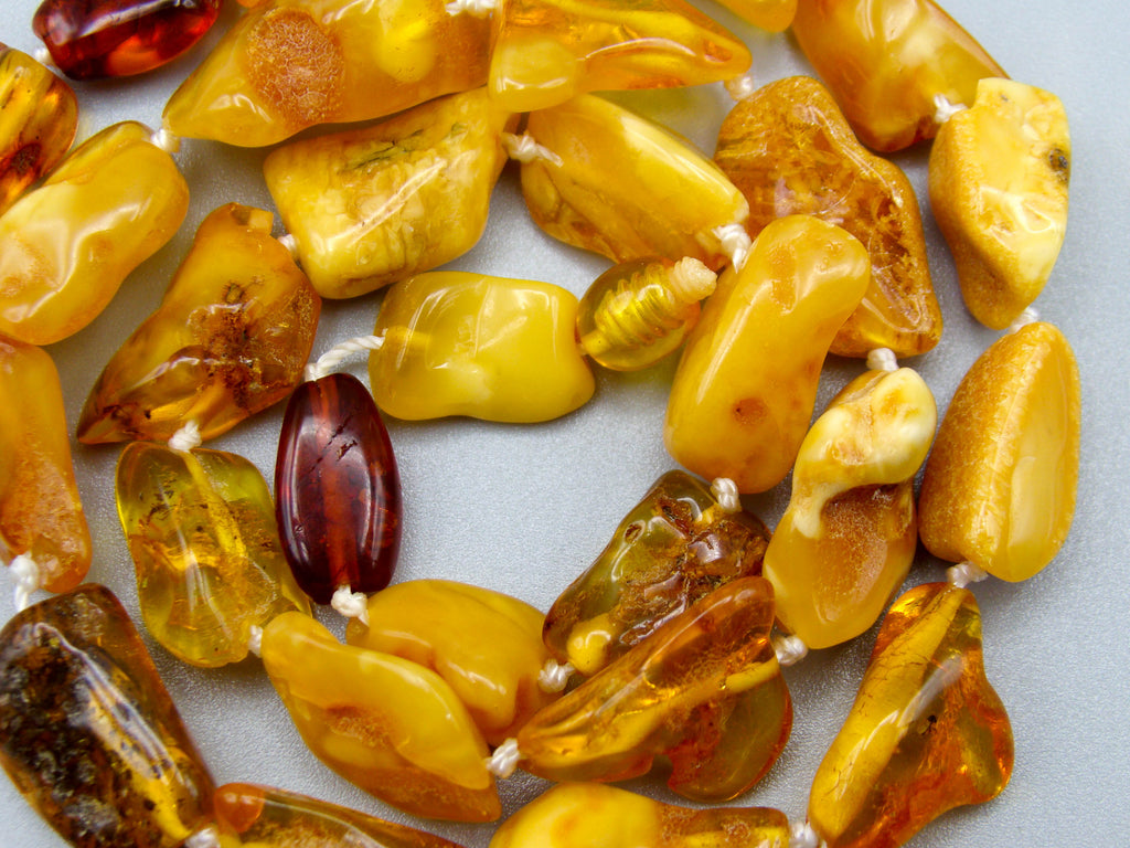 baltic amber, amber, antique, amber beads, egg Yolk, amber chain, Rosary beads, مسبحة, Masbaha, Muslim prayer beads حبيت الدورة ,العنبر الهندى